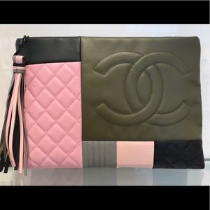 Authentic Chanel patchwork medium pouch.